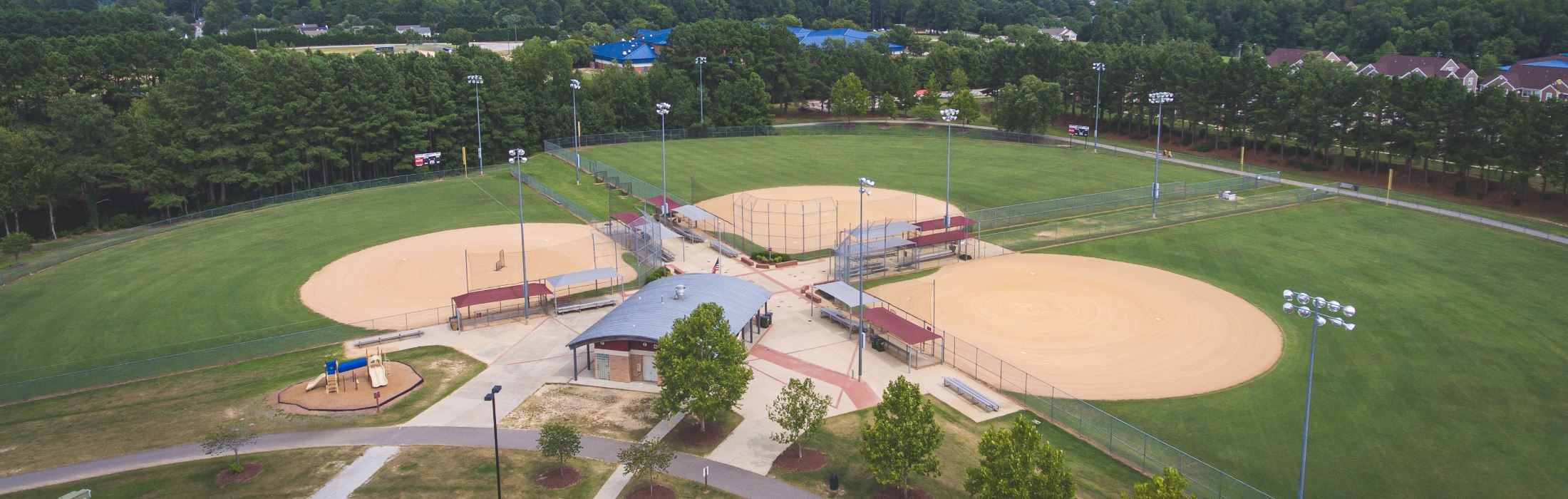 A community park with ballfields and a playground in Clayton, NC